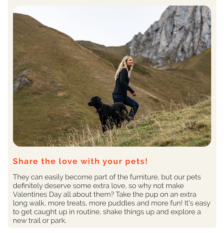Woman walking with a dog in hills. Text encourages sharing love with pets through walks and play.