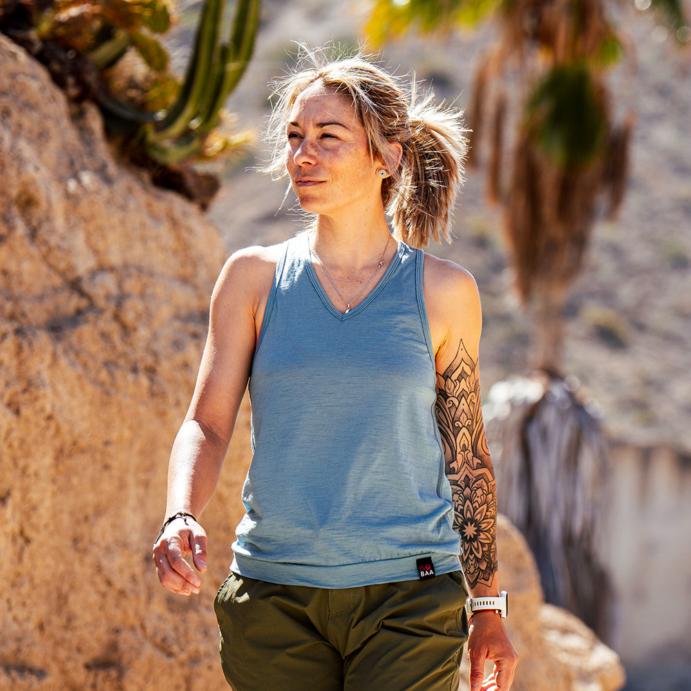 Womens 120 Ultrafine Racer Vest (Lagoon) | Model: IsabelC