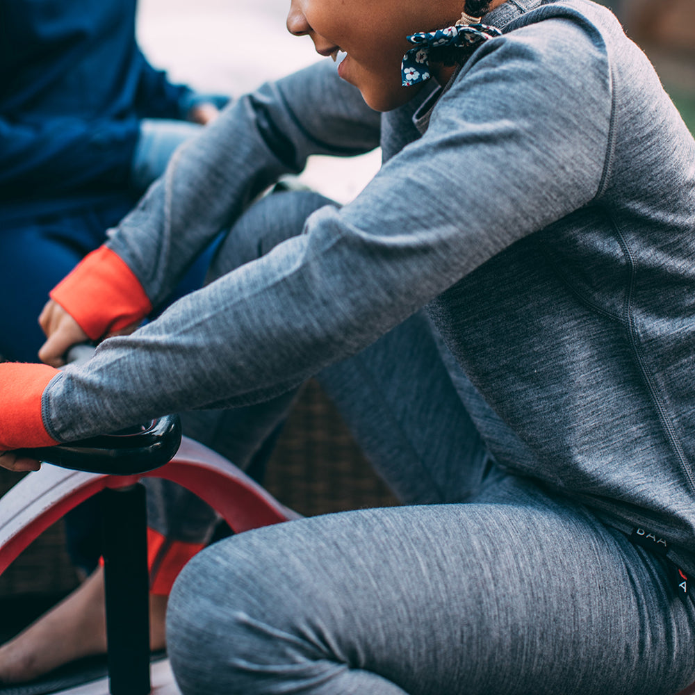 Isobaa | Junior Merino Blend 200 Long Sleeve Crew (Charcoal/Orange) | Your child's new favorite top: warm, breathable, and always comfortable thanks to Isobaa's Merino Wool blend.