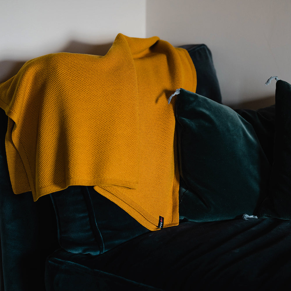 Isobaa | Merino Honeycomb Shawl (Mustard) | Chase away the chill in style with Isobaa's extra-fine Merino shawl.