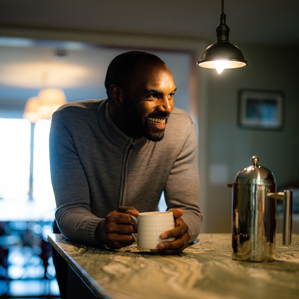 Isobaa | Mens Merino Zip Sweater (Charcoal Melange) | Discover exceptional warmth, comfort, and everyday versatility with our extrafine Merino wool sweater.