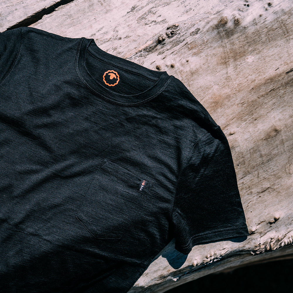 Isobaa | Mens Merino 150 Pocket Tee (Black) | Gear up for outdoor adventure with Isobaa's superfine Merino Tee – a perfect blend of comfort, practicality, and sustainable design.