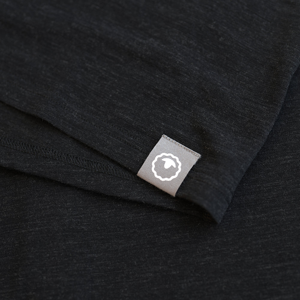 Isobaa | Mens Merino Blend 160 PJ Henley (Black Melange) | Relax with our superfine Merino blend Henley.