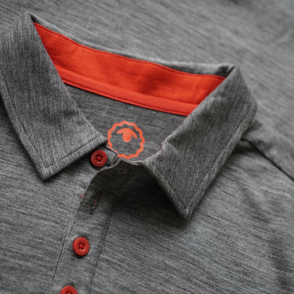 Isobaa | Mens Merino 200 Long Sleeve Polo Shirt (Charcoal/Orange) | Discover unmatched comfort with our 200gm Merino wool polo.