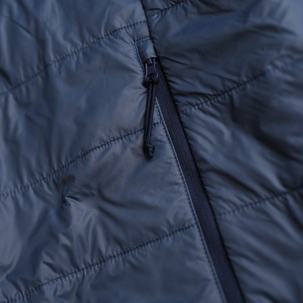 Isobaa | Mens Packable Insulated Jacket (Denim/Navy) | Exceptional warmth, packable convenience, and sustainable design with our lightweight Merino wool jacket.