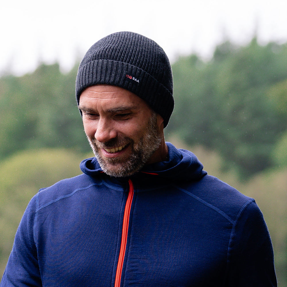 Isobaa | Merino Fisherman Beanie (Black Melange) | From mountain trails to city streets, our extra-fine Merino fisherman beanie delivers classic style and unmatched comfort.