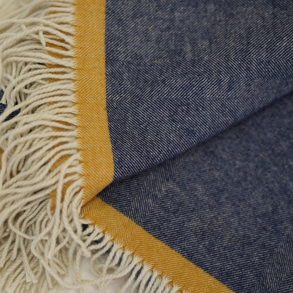 Isobaa | Merino Herringbone Throw (Navy/Mustard Stripe) | Wrap yourself in pure comfort with Isobaa's super-soft Merino throw.