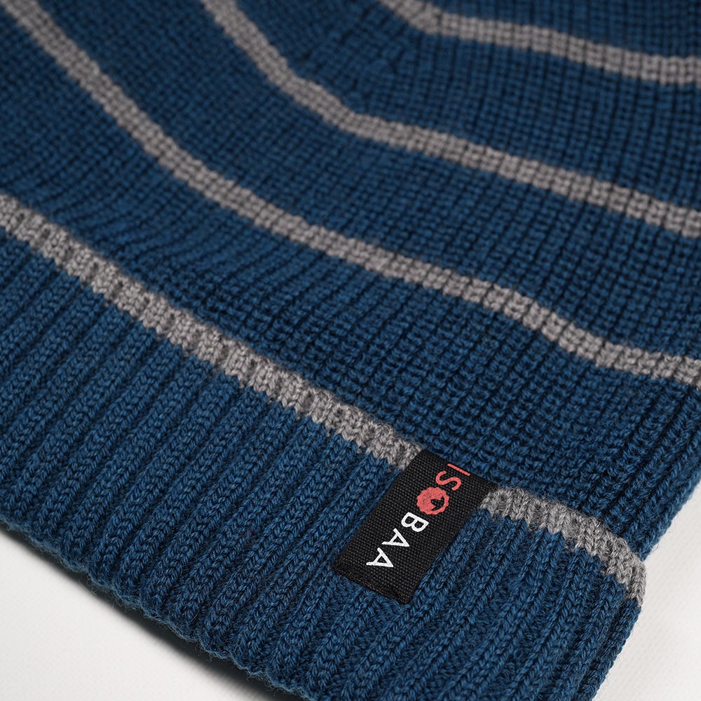 Isobaa | Merino Stripe Beanie (Petrol/Charcoal) | Wrap yourself in cosy warmth with Isobaa's Merino beanie.