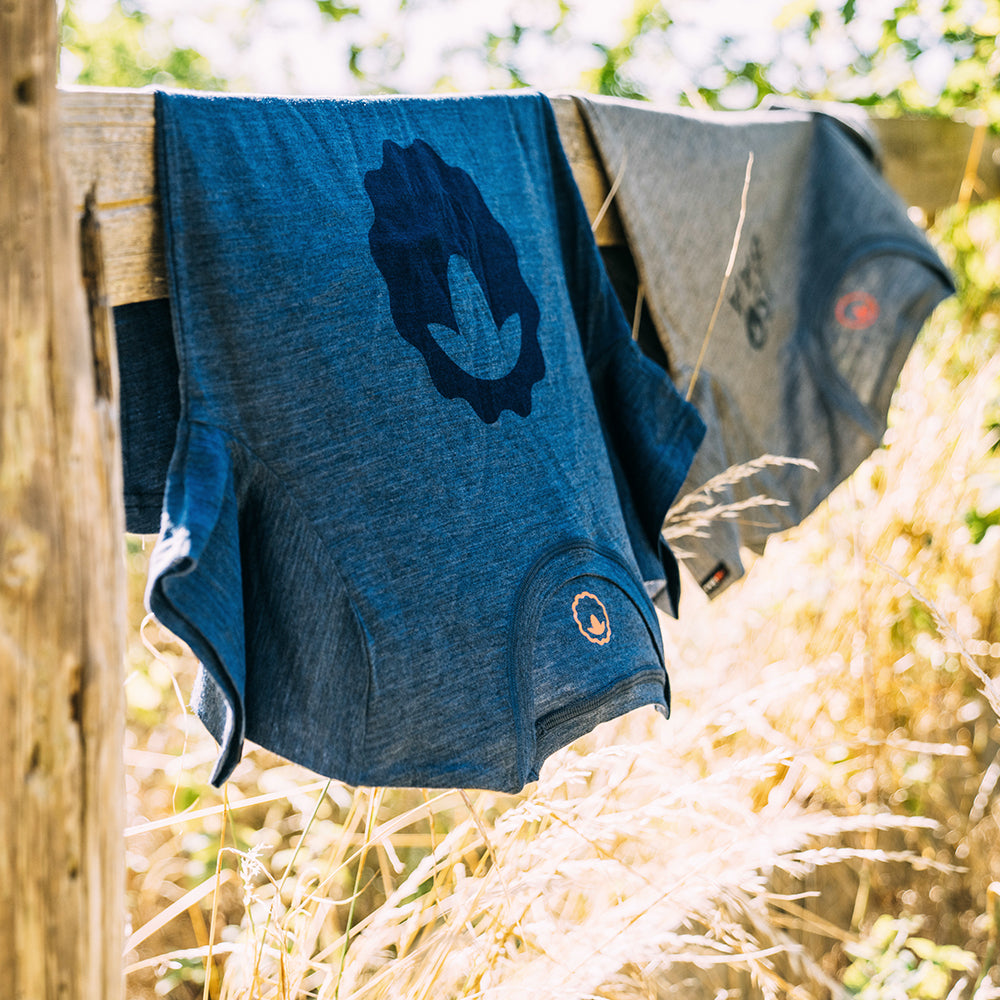 Isobaa | Womens Merino 150 Emblem Tee (Denim) | Conquer trails and city streets in comfort with Isobaa's superfine Merino T-Shirt.