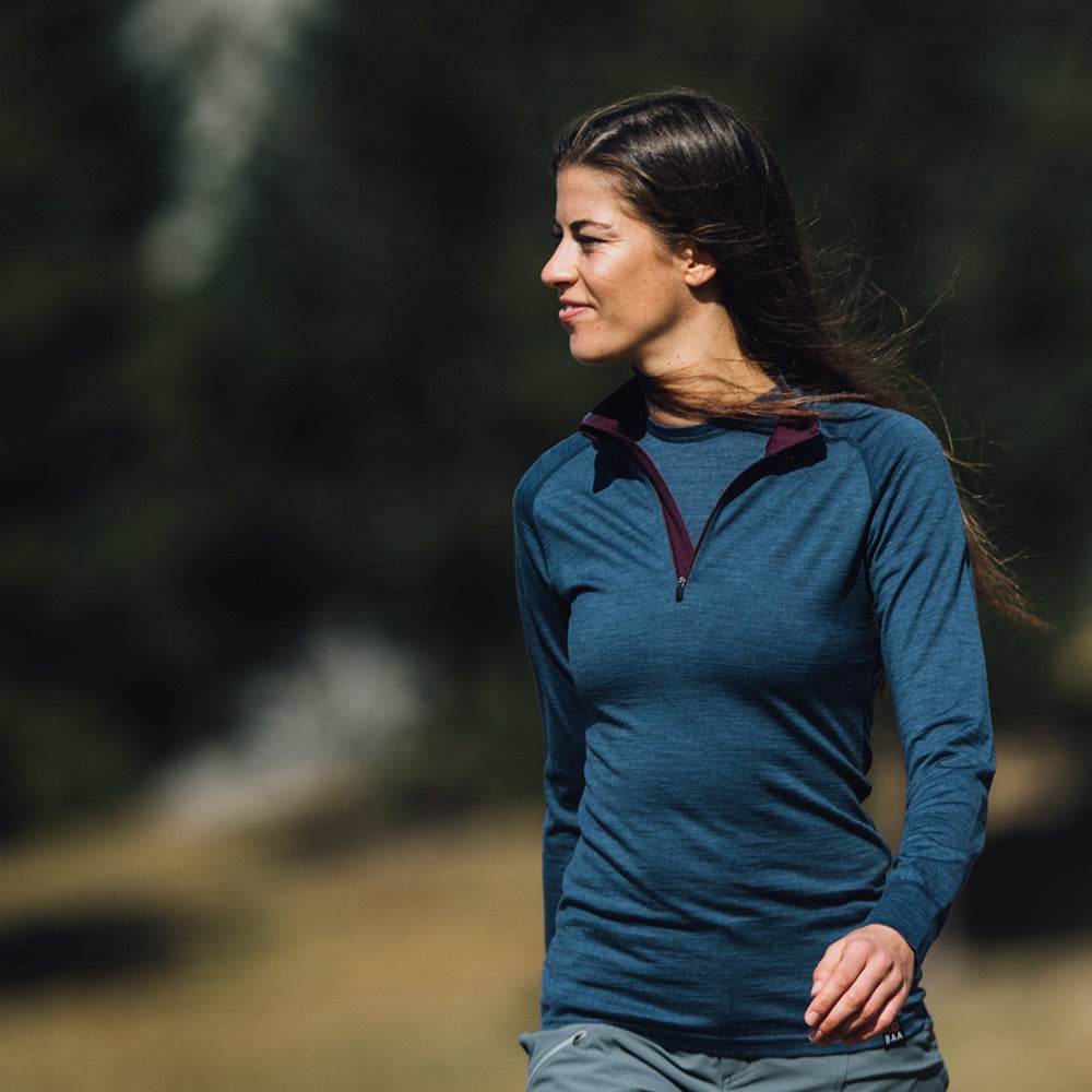 Isobaa | Womens Merino 200 Long Sleeve Zip Neck (Denim) | Experience the best of 200gm Merino wool with this ultimate half-zip top – your go-to for challenging hikes, chilly bike commutes, post-workout layering, and unpredictable weather.