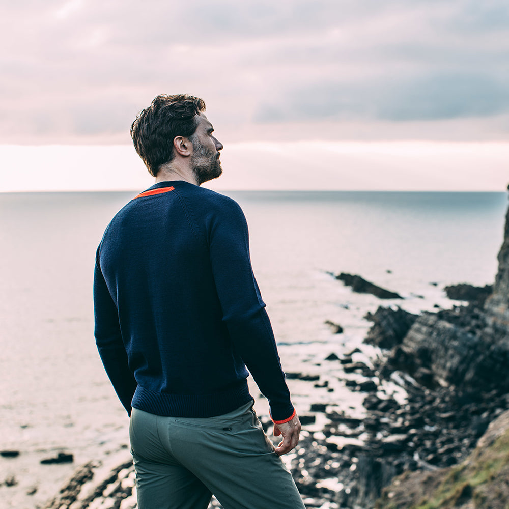 Isobaa | Mens Merino Crew Sweater (Navy/Orange) | Everyday warmth and comfort with our superfine 12-gauge Merino wool crew neck sweater.