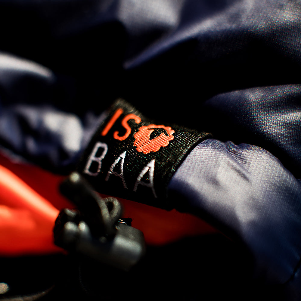 Isobaa | Mens Merino Wool Insulated Jacket (Navy/Orange) | Innovative and sustainable design with our Merino jacket.