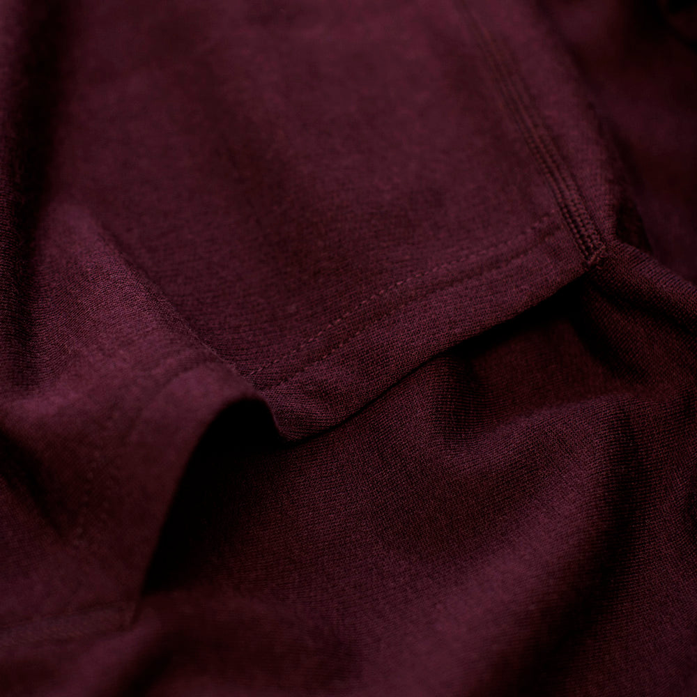 Isobaa | Womens Merino 260 Lounge Hoodie (Wine/Navy) | Experience the best in comfort and performance with our midweight 260gm Merino wool pullover hoodie.